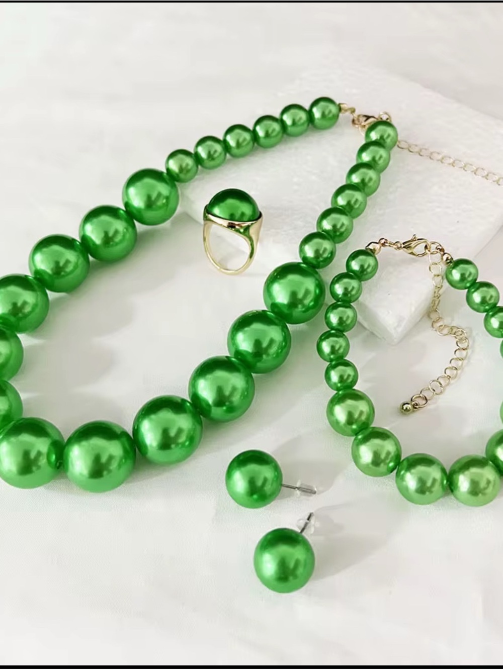 Lustrous Green Pearl Necklace with Gold Accents